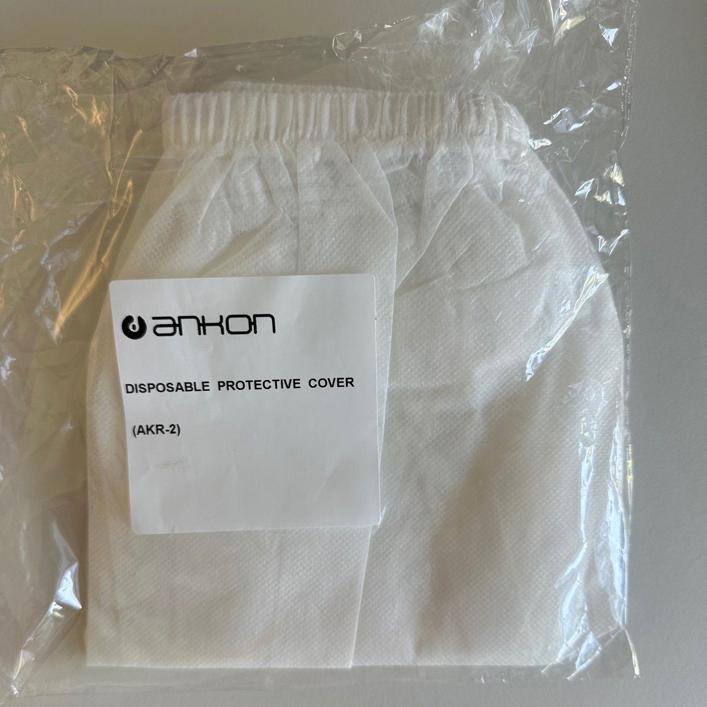 Housse de protection jetable